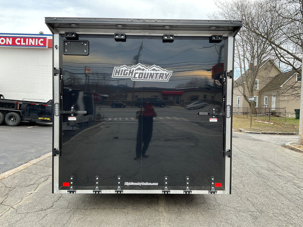 Enclosed Car Hauler Trailer 8.5’x24′ Flat Front Black Blackout Ramp High Country Aluminum Ron's Toy Shop, Inc.