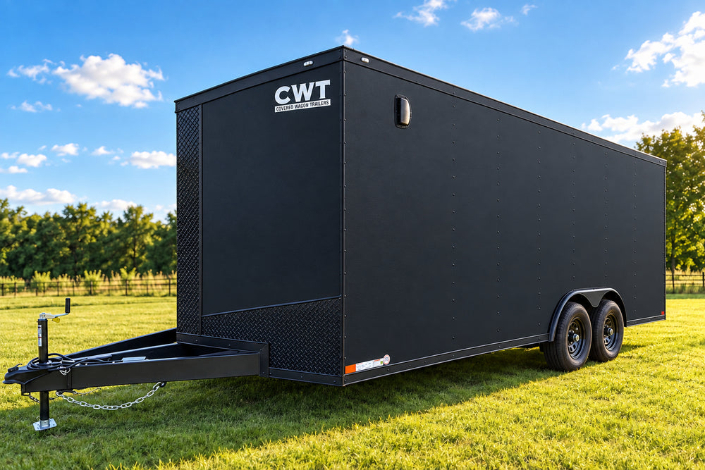 A black enclosed cargo trailer parked outdoors on a paved lot. The trailer has a glossy finish, a front hitch, dual axles, and a white 'CWT' logo on the upper side.