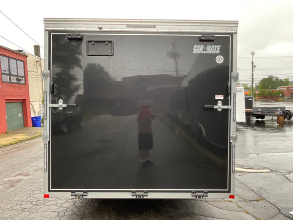 Car Mate Trailers Custom Enclosed Car Hauler Trailer 8.5'x24' Black Car Mate Avalanche 9990 GVWR, 7' Interior Height, Extended Tongue, Adj. Coupler, 8k Tongue Jack, Get-Out Man Door, 4 HD D-Rings, Lifetime + 5 Year Warranty