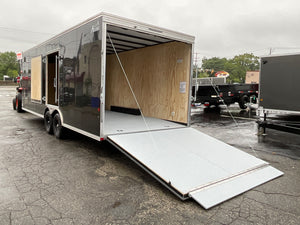 Car Mate Trailers Custom Enclosed Car Hauler Trailer 8.5'x24' Black Car Mate Avalanche 9990 GVWR, 7' Interior Height, Extended Tongue, Adj. Coupler, 8k Tongue Jack, Get-Out Man Door, 4 HD D-Rings, Lifetime + 5 Year Warranty