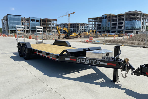 Moritz International Commercial Grade Equipment Trailer 81.5"x20' Moritz Black 14,000 GVWR, Cold Formed 8" I Beam, Aluminum Tool Box, Aluminum Ramps, Torsion Axles, 4 Bolt Forged Coupler, Tie Downs Between Fenders, HD Stake Pockets, 2 Year Warranty Moritz International