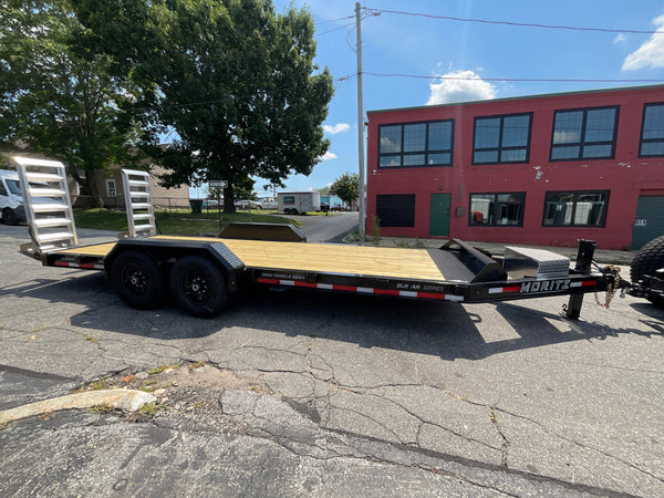 Moritz International Commercial Grade Equipment Trailer 81.5"x20' Moritz Black 14,000 GVWR, Cold Formed 8" I Beam, Aluminum Tool Box, Aluminum Ramps, Torsion Axles, 4 Bolt Forged Coupler, Tie Downs Between Fenders, HD Stake Pockets, 2 Year Warranty Moritz International