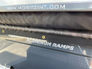 Moritz International Scissor Hoist Dump Trailer 81.5"x14' Charcoal, 14k GVWR, Cold Rolled 8" I-Beam, Torsion Axles, Aluminum Ramps, 24" Sides, Stake Pockets, Solar Charger, Hydraulic Jack, Tarp Kit, Forged 4-Bolt Coupler, 2 Year Warranty