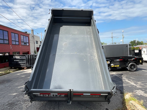 Moritz International Scissor Hoist Dump Trailer 81.5"x14' Charcoal, 14k GVWR, Cold Rolled 8" I-Beam, Torsion Axles, Aluminum Ramps, 24" Sides, Stake Pockets, Solar Charger, Hydraulic Jack, Tarp Kit, Forged 4-Bolt Coupler, 2 Year Warranty