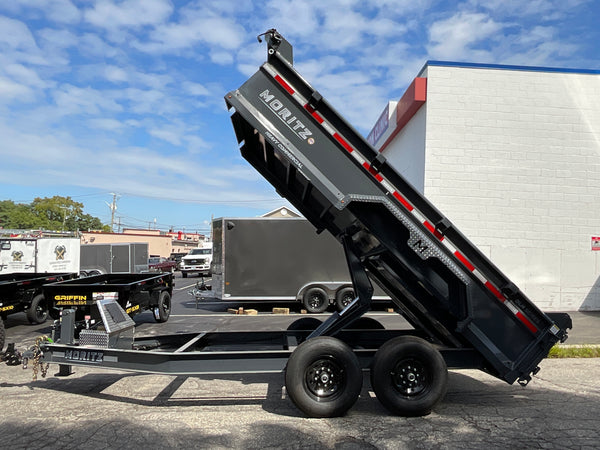 Moritz International Scissor Hoist Dump Trailer 81.5"x14' Charcoal, 14k GVWR, Cold Rolled 8" I-Beam, Torsion Axles, Aluminum Ramps, 24" Sides, Stake Pockets, Solar Charger, Hydraulic Jack, Tarp Kit, Forged 4-Bolt Coupler, 2 Year Warranty