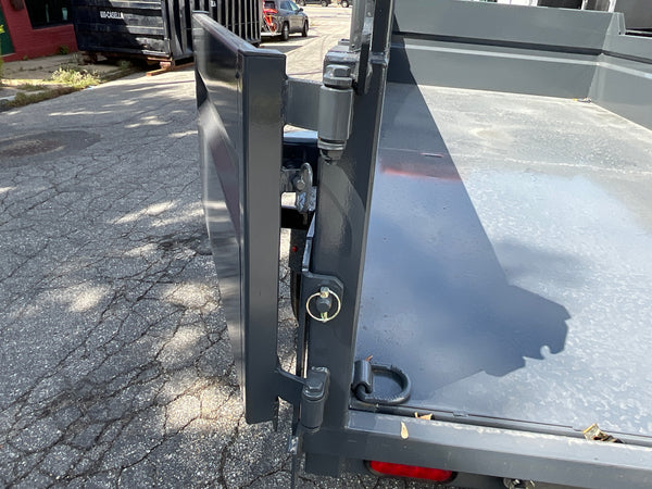 Moritz International Scissor Hoist Dump Trailer 81.5"x14' Charcoal, 14k GVWR, Cold Rolled 8" I-Beam, Torsion Axles, Aluminum Ramps, 24" Sides, Stake Pockets, Solar Charger, Hydraulic Jack, Tarp Kit, Forged 4-Bolt Coupler, 2 Year Warranty