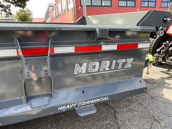 Moritz International Scissor Hoist Dump Trailer 81.5"x14' Charcoal, 14k GVWR, Cold Rolled 8" I-Beam, Torsion Axles, Aluminum Ramps, 24" Sides, Stake Pockets, Solar Charger, Hydraulic Jack, Tarp Kit, Forged 4-Bolt Coupler, 2 Year Warranty