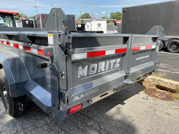 Moritz International Scissor Hoist Dump Trailer 81.5"x14' Charcoal, 14k GVWR, Cold Rolled 8" I-Beam, Torsion Axles, Aluminum Ramps, 24" Sides, Stake Pockets, Solar Charger, Hydraulic Jack, Tarp Kit, Forged 4-Bolt Coupler, 2 Year Warranty